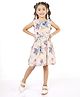 melon Cotton Woven Sleeveless Floral Printed Frock With Bow Applique & Frill Detailing - Beige