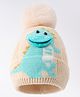 Babyhug Woollen Cap with Dino Design & Bobble Applique Beige & Light Blue - Diameter 11 cm