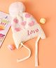 Babyhug Woollen Cap With Heart Design Cream - Diameter 12 cm