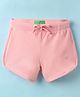 UCB Knit Knee Length Solid Color Shorts with Brand Logo - Pink