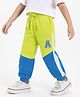 Babyhug Cotton Terry Knit Full Length Lounge Pants with Color Block & Cut & Sew Design - Yellow & Blue