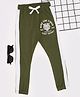 Pantaloons Junior Cotton Knit Ride The Tides Text Printed Side Taped Track Pants - Olive Green