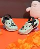 TRUFFLE COLLECTION Perforated Clogs With Dinosaurs Text Charms - Green