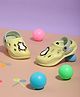 TRUFFLE COLLECTION Colour Blocked Perforated Clogs With Penguin Charms - Yellow