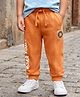 Babyhug Terry Cotton Knit Full Length Text Printed Cut & Sew Lounge Pant With Animal Patch - Rust Orange