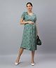 Mamma's Maternity Cotton Woven Half Sleeves Floral Printed Maternity Night Dress With Side Concealed Zipper Nursing Access - Sage Green