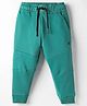 Doreme Knit Fleece Woven Full Length Solid Colour Pant With Cut & Sew Design - Green