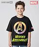 Pine Kids Marvel Single Jersey Knit Oversize Drop Shoulder Half Sleeves T-Shirt with Avengers Graphics and Holographic Print Detailing - Black