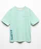 ALAN JONES Cotton Blend Knit Half Drop Shoulder Sleeves Surfer Text Printed Oversized Tee - Aqua Blue