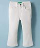 UCB Woven Full Length Solid Color Boot Cut Jeans - White