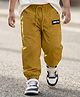 Babyhug Woven Full Length Solid Trouser With Stretch - Dark Yellow
