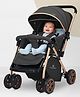 StarAndDaisy Foldable Baby Stroller with 360° Swivel  Multi-Level Recline & Adjustable Footrest, Safety Harness Belt - Black