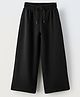ALAN JONES Cotton Blend Knit Solid Flared Pants - Black