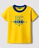 UCB Woven Half Sleeves T-Shirt With Text Print - Yellow