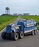 Play Nation Friction Power Water Tank Truck with Lights & Music Sanitation Theme Watering Cart Monster Wheels| Imaginative Action Play Set for Creativity & Role Play Gifting Option -Blue