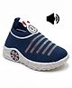 Lil Lollipop Slip On Striped Musical Shoes With Bee Applique - Navy Blue