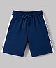 Taeko Single Jersey Knit Knee Length Shorts with Side Text Print - Navy Blue