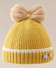 Babyhug Woollen Cap With Floral Applique Bow On Top Yellow - Diameter 9 cm