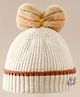 Babyhug Woollen Cap With Floral Applique Bow On Top White - Diameter 9 cm
