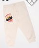 Pantaloons Baby Cotton Knit Monster Truck Printed Joggers - Cream