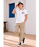Trampoline Cotton Blend Knit Half Sleeves Motorcycle Text Printed Polo Tee & Cargo Style Trousers Set - White & Beige
