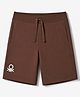 UCB Knit Knee Length Solid Shorts With Logo Print- Brown