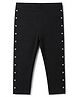 Babyhug Cotton Elastane Knit Full Length Solid Leggings With Heart Foil Print - Black