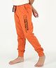 REBORN Cotton Woven Outdoor Text Printed Joggers - Rust Orange