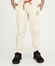 REBORN Cotton Woven Just Planet Peace Text Printed Joggers - Butter Cream