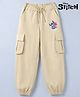 HoneyHap Disney 100% Cotton Terry Knit Jogger Fit Full Length Track Pant with Stitch and Angel Graphic Text and Cargo Pocket in Beige