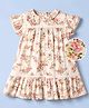 Kookie Kids Woven Tiered Dress with Flutter Sleeves and Floral Print in Cream