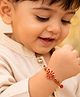 Little Tresses  Small Flower Beads and Thread Rakhi - Red & Golden