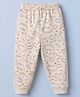 Pink Rabbit Fleece Knit Full Length Jogger Bottomwear with Dinosaurs Print in Beige