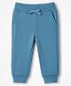 UCB Cotton Mixes Knit Regular Fit Full Length Lounge Pants with Benetton Text on Back Pocket Print - Dark Green