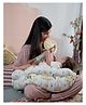 The Baby Trunk Feeding Pillow Cradle - Carnival - Multi