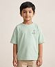 Rikidoos Embosis Hosiery Woven Half Drop Shoulder Sleeves Oversized T-Shirt With Swirl Print - Light Green