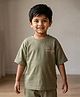Rikidoos Cotton Blend Woven Oversized T-Shirt with Half Sleeves and Drop Shoulder Sleeves and Surf Essentials Print - Olive Green