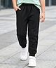 Tiara Interlock Knit Solid Joggers - Black
