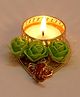Passion Petals Decorative T-Light With Ganeshji And Green Flowers