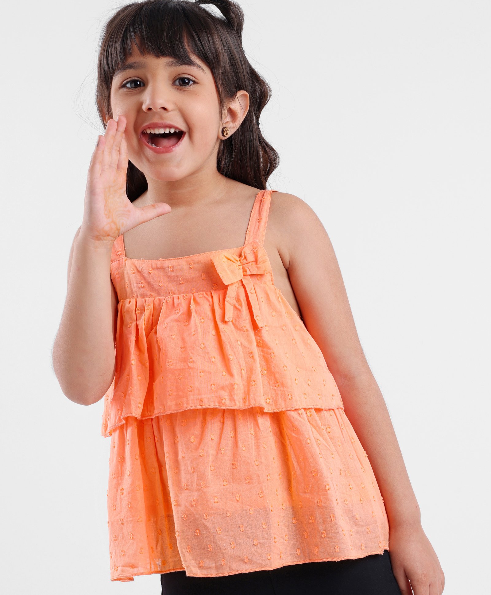 Babyhug Sleeveless Swiss Dot Woven Top With Bow & Frill Detailing - Peach-picture-14