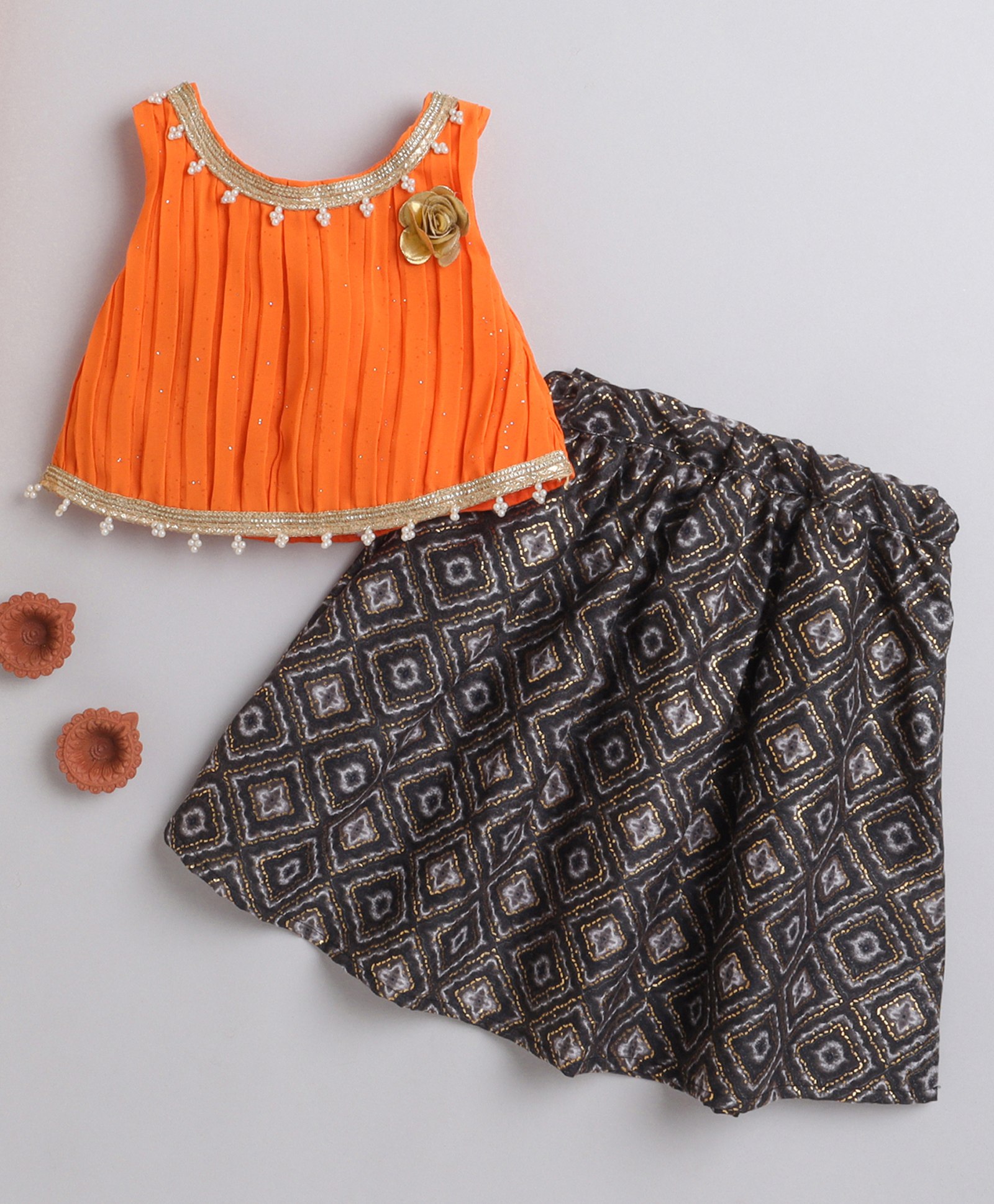 Many frocks & Sleeveless Shimmer & Gota Lace Embellished Choli With Block Motif Pleated Lehenga - Orange & Black-image-9