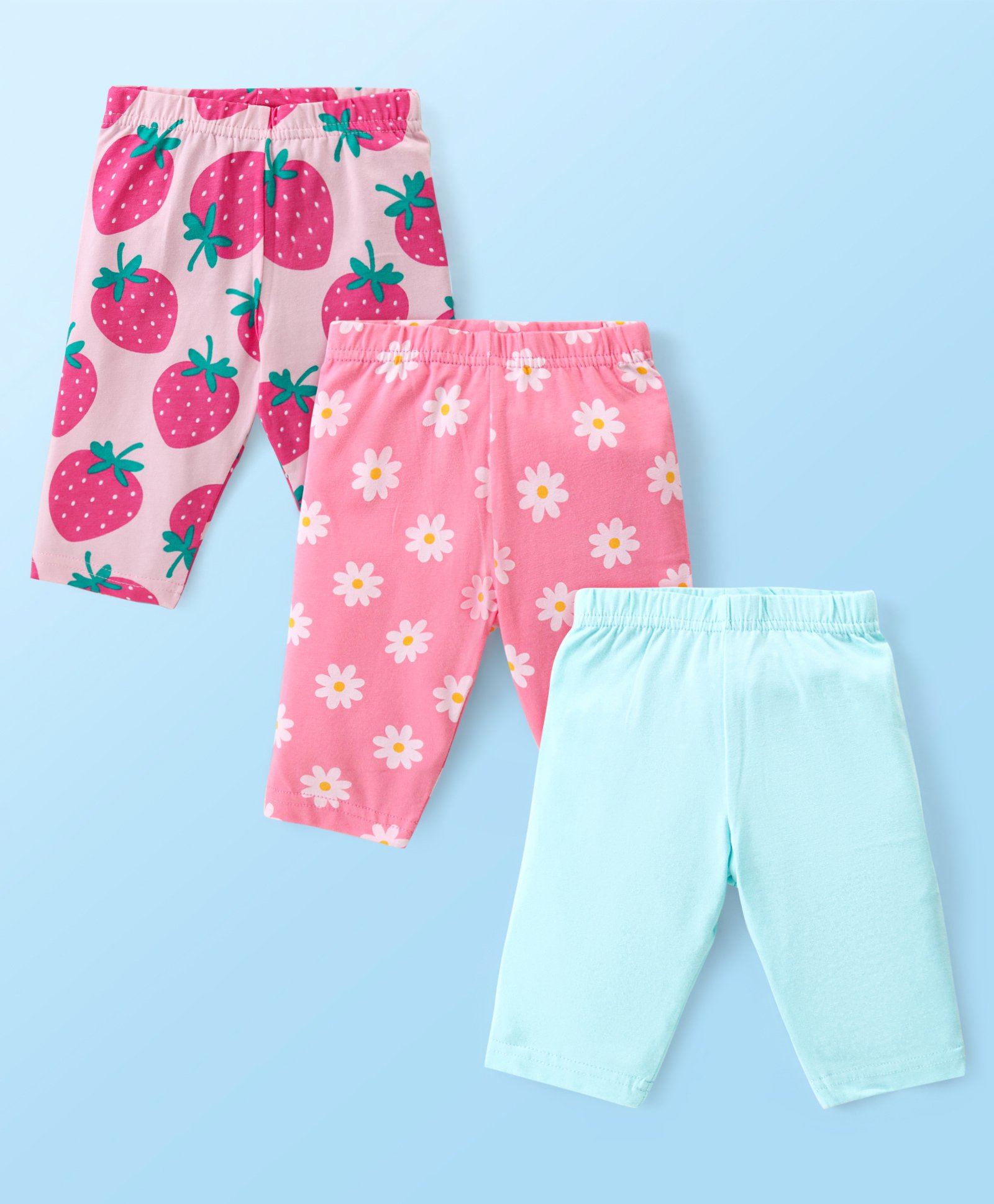 Babyhug Cotton Lycra Knit Three Fourth Leggings with Solid Floral & Strawberry Print Pack of 3 - Blue & Pink