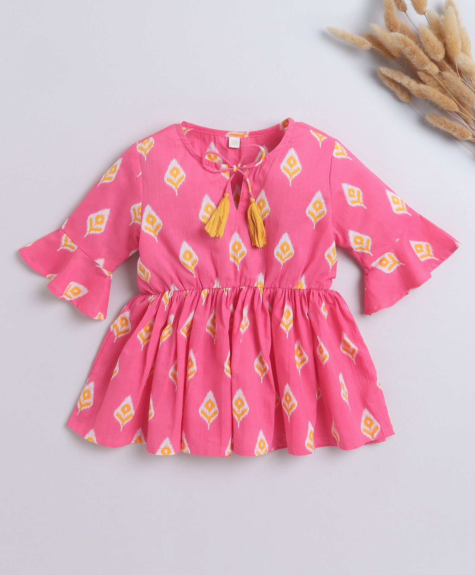 The Magic Wand Cotton Three Fourth Bell Sleeves Ikat Printed Gathered Top With Tassels - Pink-picture-19
