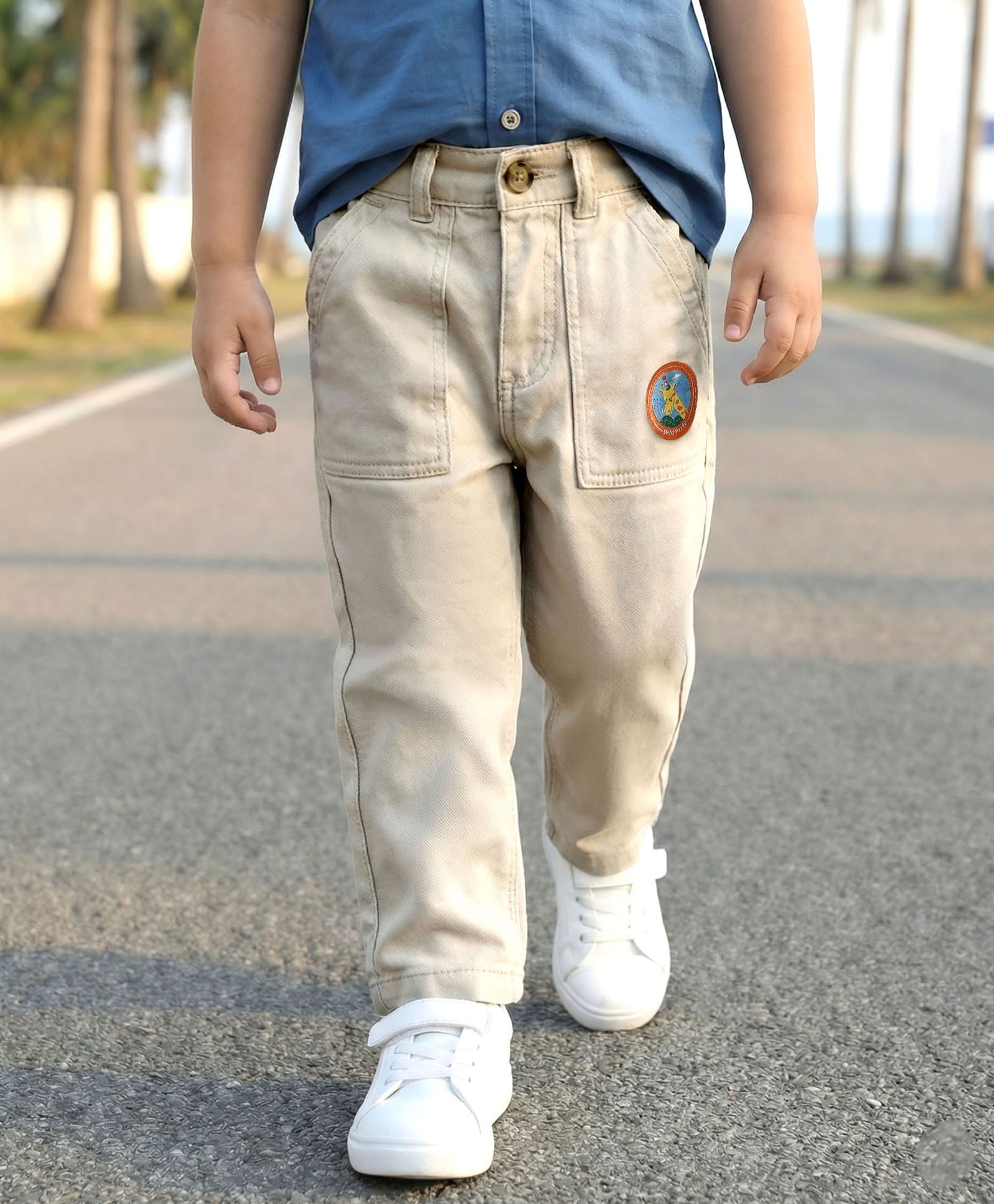 Babyhug Cotton Lycra Woven Full Length Solid Coloured Trouser With Stretch & Animal Patch - Beige-image-18