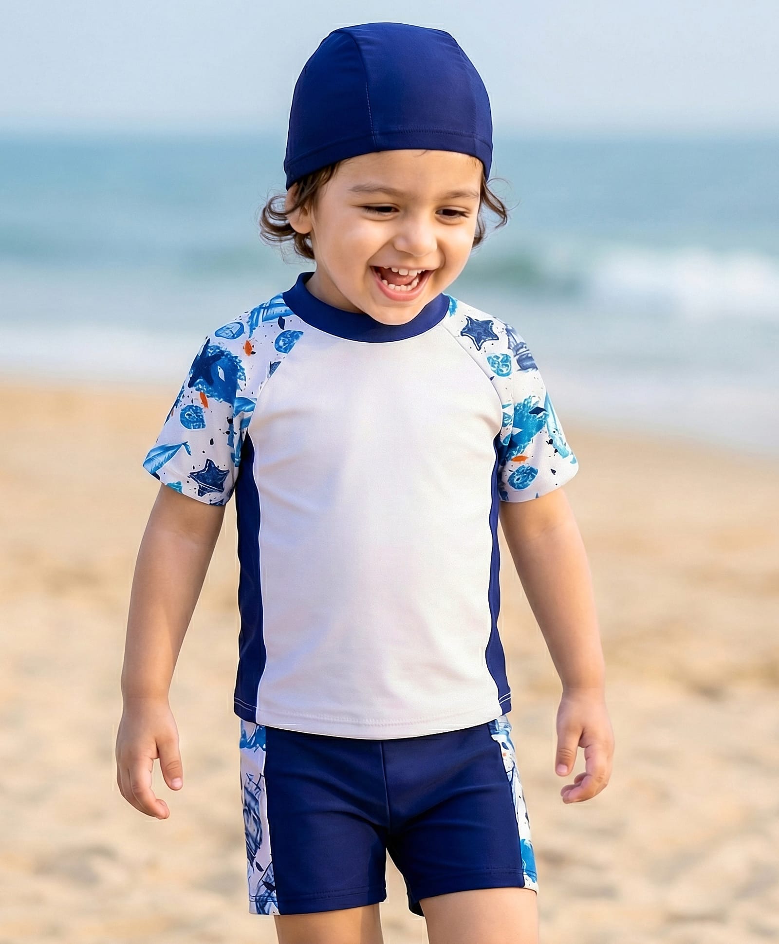Babyhug Half Raglan Sleeves Two Piece Swimsuit With Nautical Theme & Cap - White
