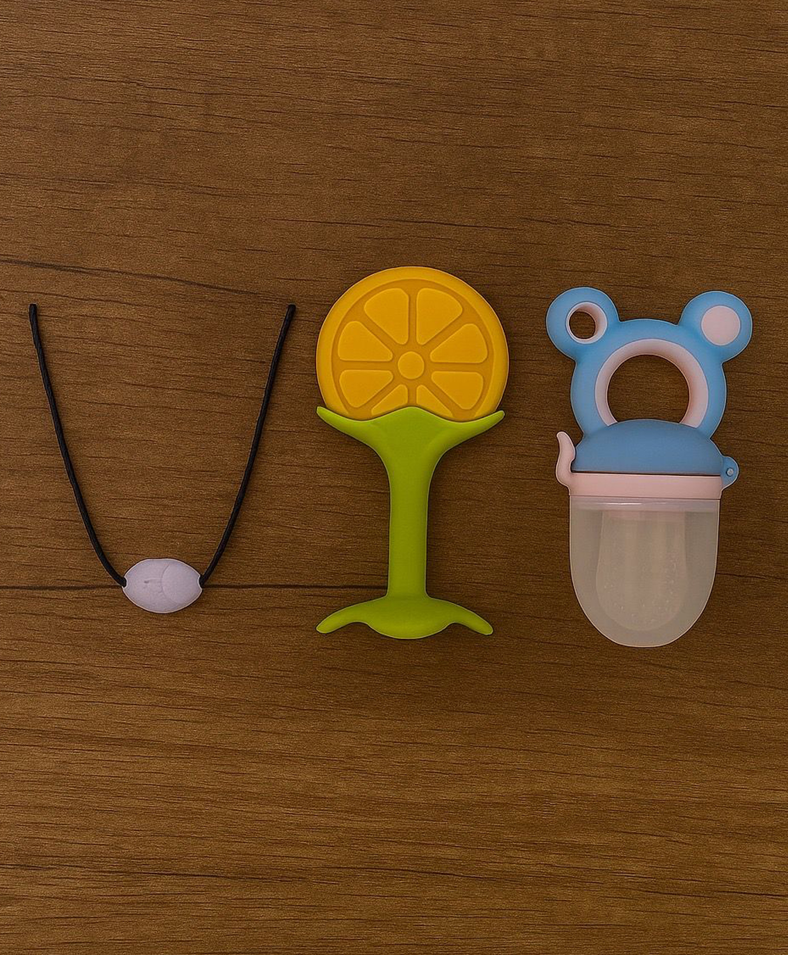 Badal Kidz Presents combo of 3 includes 1 Standing Fruit Teether ,1 Mickey Fruit Feeder and 1 tlismi moti - Orange, Blue-image-20