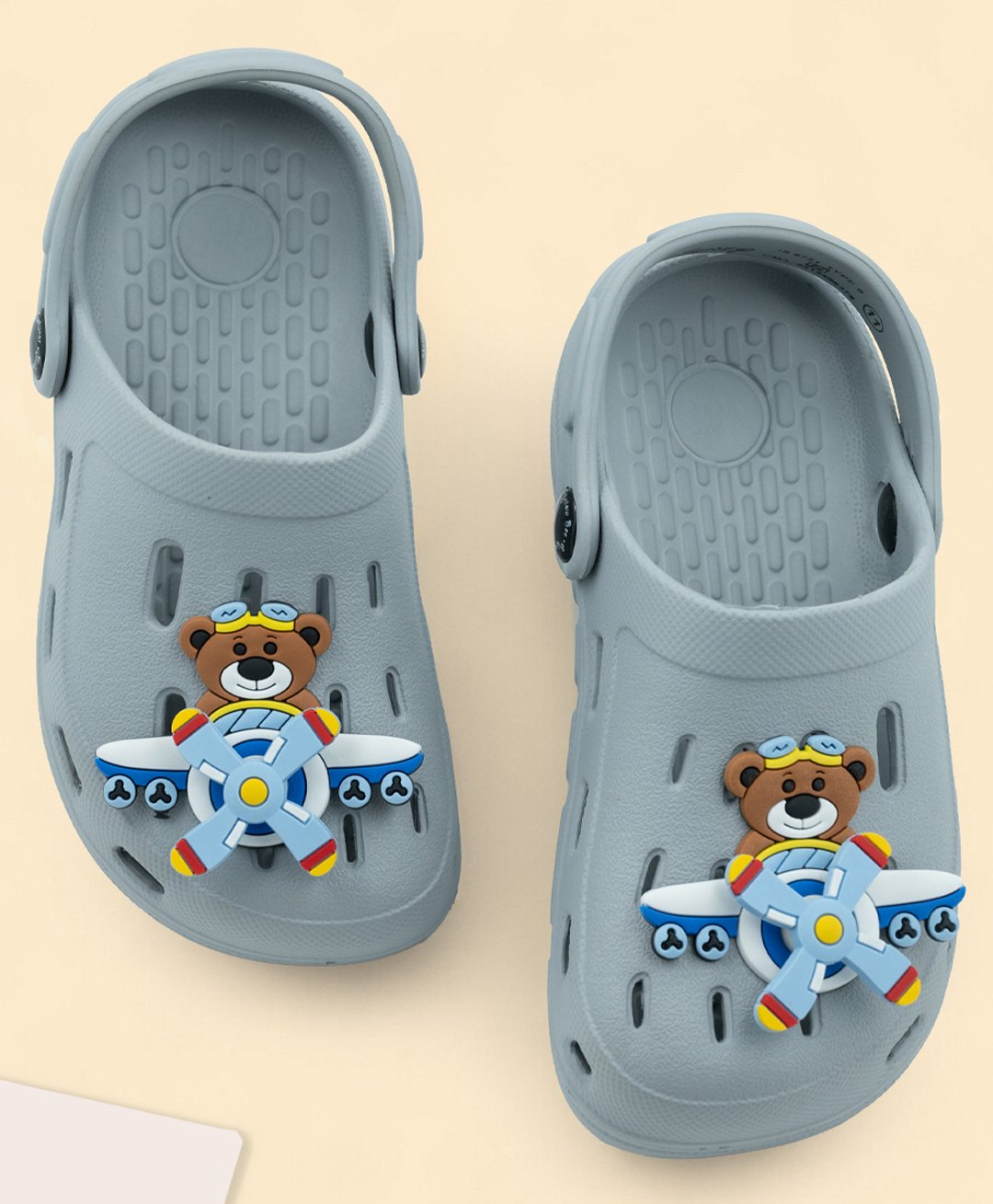 Yellow Bee Perforated Clogs With Aeroplane Rotating Charms - Grey-image-33