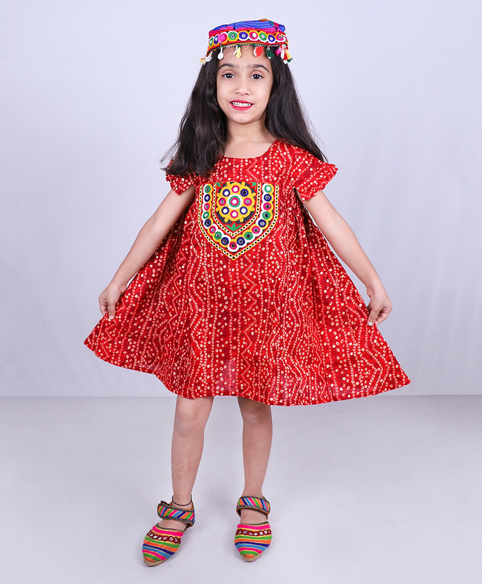 Aglare Navratri Theme Cotton Woven Half Sleeves Mirror Patch Detailed Bandhani Design Dress With Cap - Red-image-18
