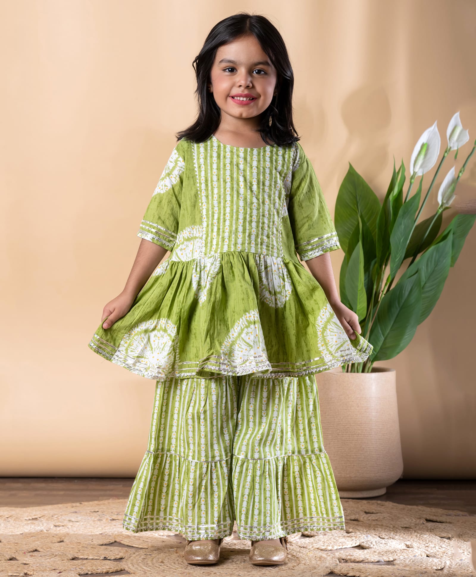 READIPRINT Cotton Woven Three Fourth Sleeves Floral Printed Gota Lace Embellished Peplum Style Kurti & Sharara Set - Green-image-36