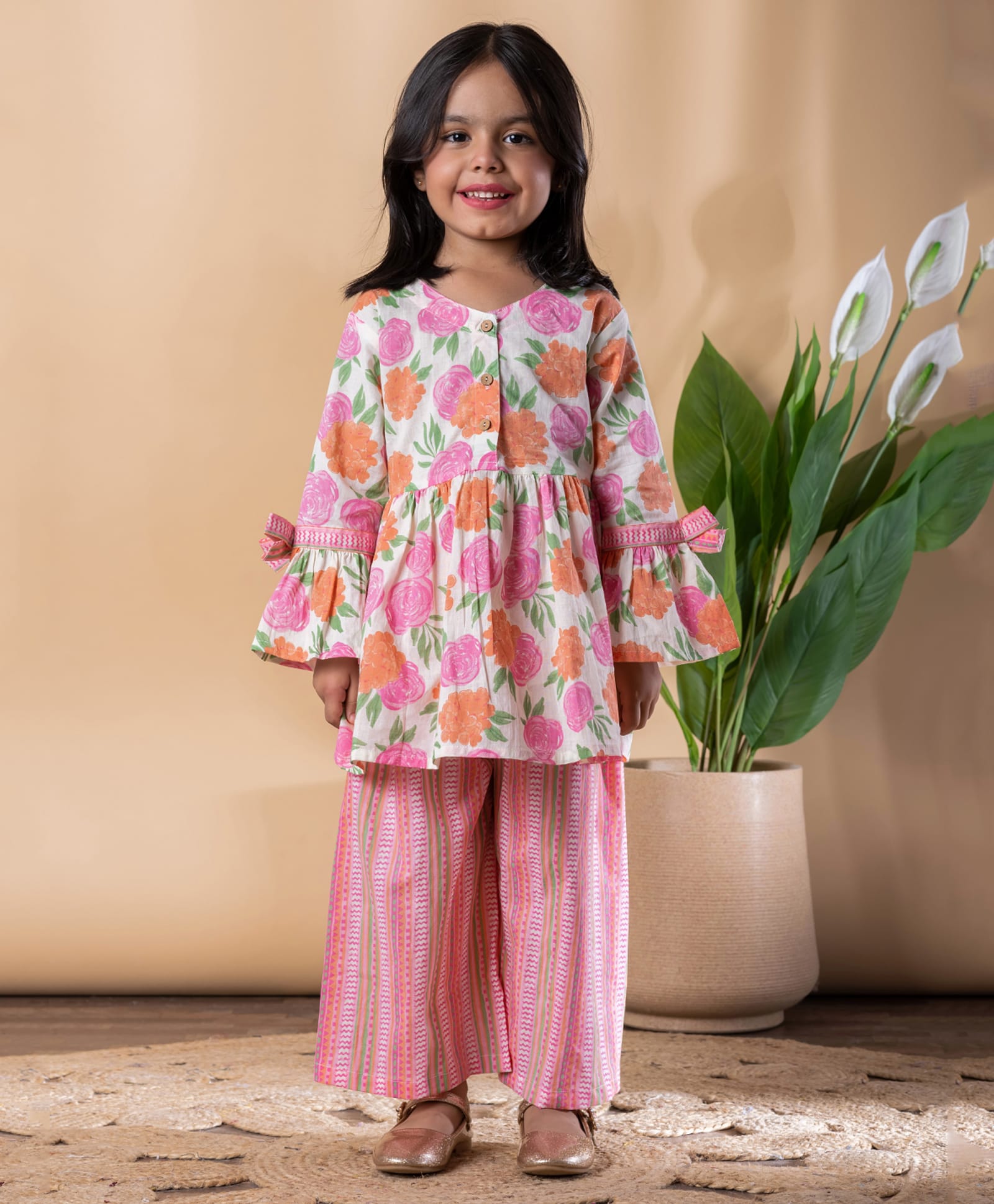 READIPRINT Cotton Woven Three Fourth Bell Sleeves Floral Printed Peplum Style Kurti & Palazzo Set - Pink-image-16